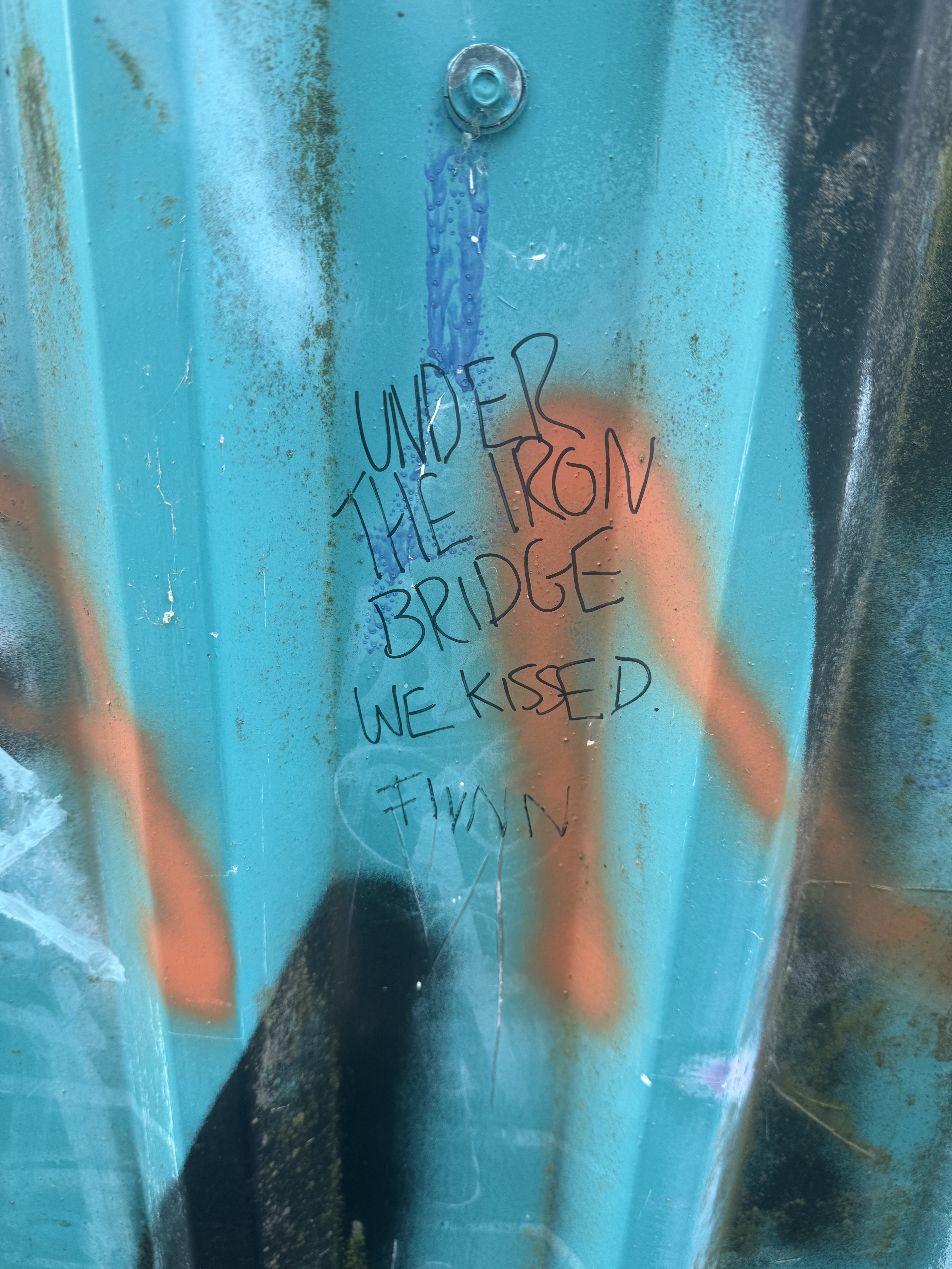Under the iron bridge we kissed